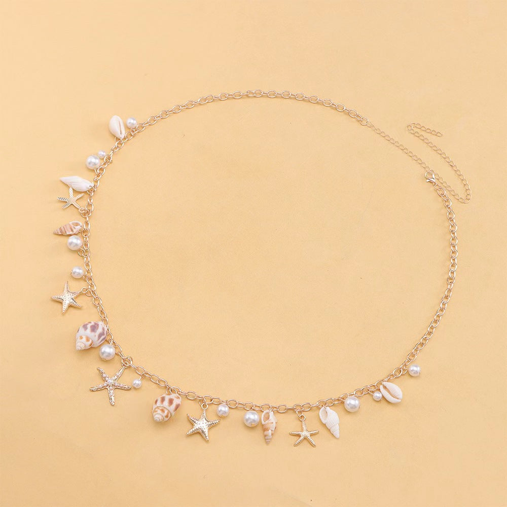 Chaîne de taille coquillages bohème dorée — collection Wavly