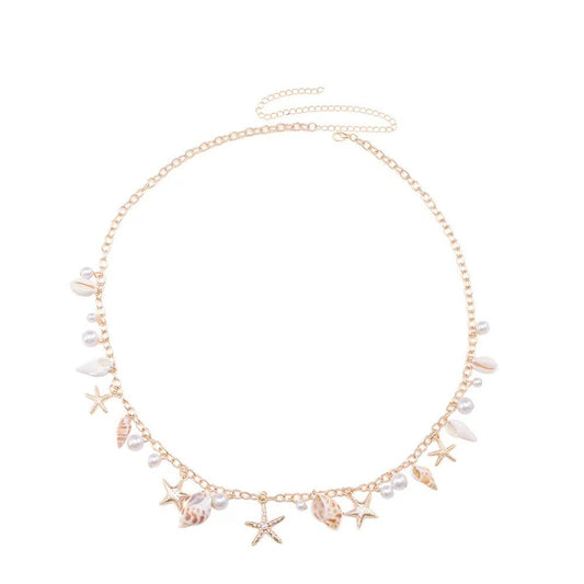 Chaîne de taille coquillages bohème dorée — collection Wavly