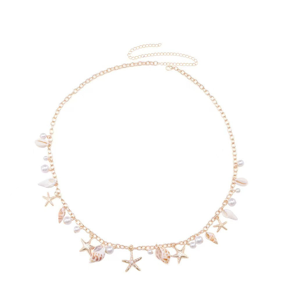 Chaîne de taille coquillages bohème dorée — collection Wavly