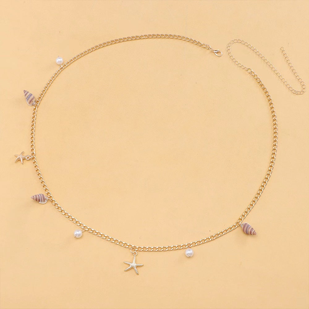 Chaîne de taille coquillages bohème dorée — collection Wavly